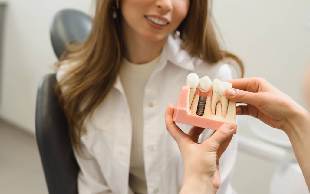 Women learning about dental implant options